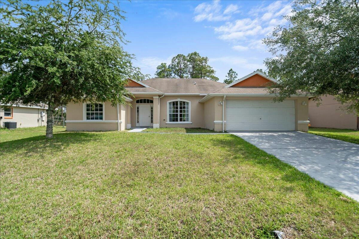 988 KENMORE ST NW, PALM BAY, FL 32907, photo 1 of 22