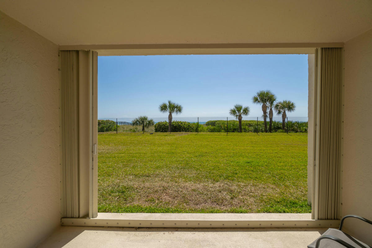 1860 N ATLANTIC AVE APT B102, COCOA BEACH, FL 32931, photo 1 of 25